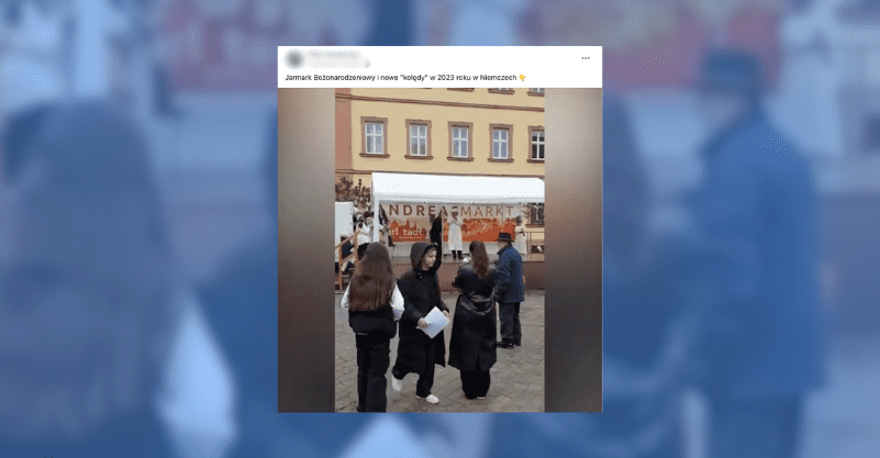 Screenshot wpisu z Facebooka, osoby stojące na jarmarku świątecznym