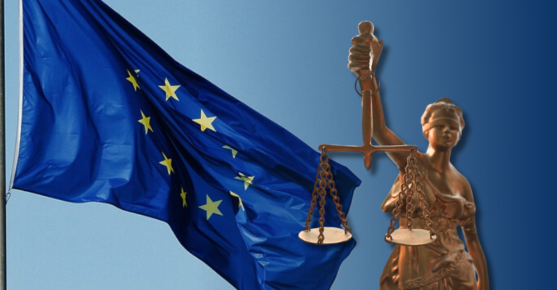 w tle flaga Unii Europejskiej