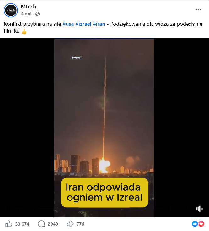 Zrzut ekranu wpisu z Facebooka, na górze podpis i elementy interfejsu platformy, na dole klatka z filmu przedstawiająca uderzenie rakiety w miasto i eksplozję.