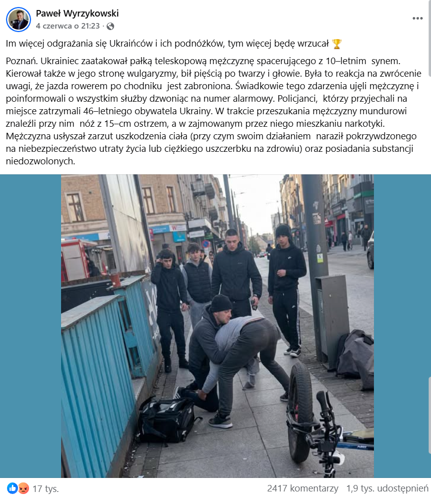 Analizowany wpis na Facebooku, gdzie pojawia się grupa mężczyzn zatrzymująca innego mężczyznę. 
